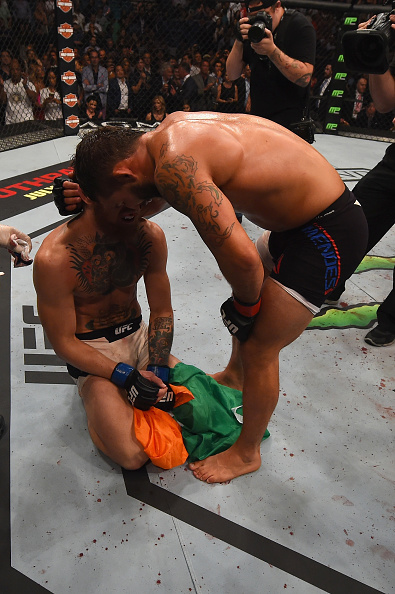 Conor McGregor and Chad Mendes congratulate each other after their UFC interim featherweight title fight during the UFC 189 event inside MGM Grand Garden Arena on July 11, 2015 in Las Vegas, Nevada. (Photo by Josh Hedges/Zuffa LLC)