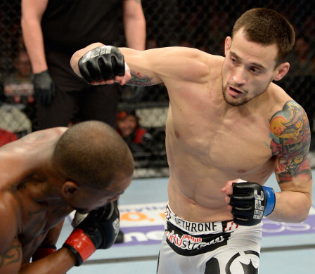 (R-L) James Krause punches <a href='../fighter/Bobby-Green'>Bobby Green</a> in their UFC lightweight bout on November 6, 2013 in Fort Campbell, KY. (Photo by Jeff Bottari/Zuffa LLC)