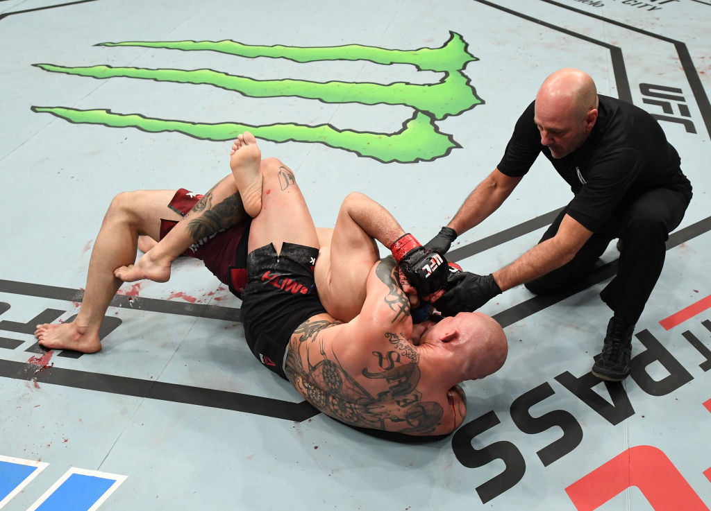 MONCTON, NB - OCTOBER 27: (R-L) <a href='../fighter/Anthony-Smith'>Anthony Smith</a> secures a rear choke submission against <a href='../fighter/Volkan-Oezdemir'>Volkan Oezdemir</a> of Switzerland in their light heavyweight bout during the <a href='../event/UFC-Silva-vs-Irvin'>UFC Fight Night </a>event inside Avenir Centre on October 27, 2018 in Moncton, New Brunswick, Canada. (Photo by Jeff Bottari/Zuffa LLC/Zuffa LLC via Getty Images)