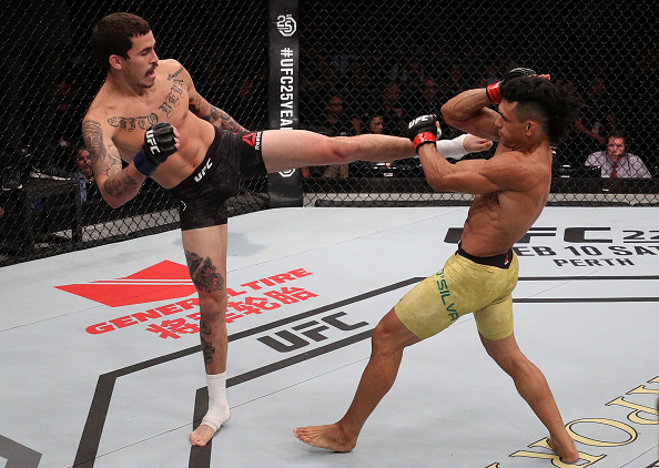 BELEM, BRAZIL - FEBRUARY 03: (L-R) <a href='../fighter/marlon-vera'>Marlon Vera</a> of Ecuador kicks <a href='../fighter/Douglas-Silva-de-Andrade'>Douglas Silva de Andrade</a> of Brazil in their bantamweight bout during the <a href='../event/UFC-Silva-vs-Irvin'>UFC Fight Night </a>event at Mangueirinho Arena on February 03, 2018 in Belem, Brazil. (Photo by Buda Mendes/Zuffa LLC/Zuffa LLC via Getty Images)