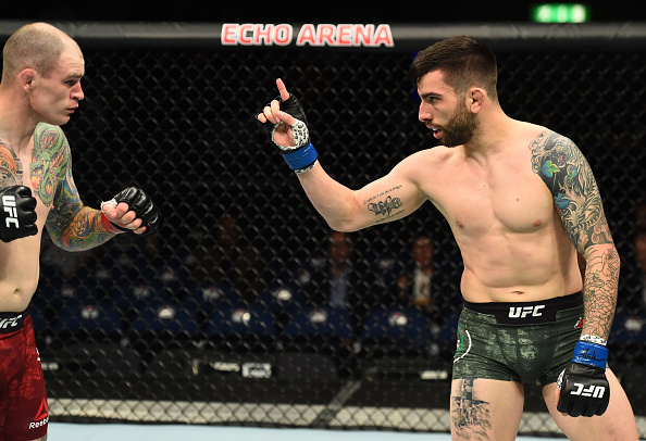 LIVERPOOL, ENGLAND - MAY 27: (R-L) Carlo Pedersoli taunts Bradley Scott of England in their welterweight bout during the UFC Fight Night event at ECHO Arena on May 27, 2018 in Liverpool, England. (Photo by Josh Hedges/Zuffa LLC/Zuffa LLC via Getty Images)