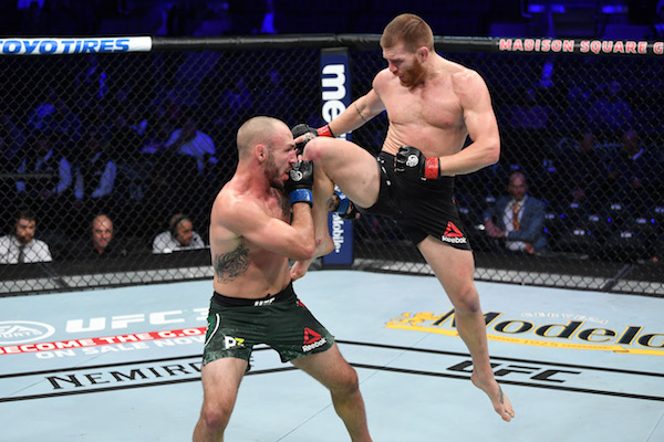 NEW YORK, NY - NOVEMBER 03: (R-L) <a href='../fighter/Matt-Frevola'>Matt Frevola</a> attempts a flying knee against <a href='../fighter/Landon-Vannata'>Lando Vannata</a> in their lightweight bout during the UFC 230 event inside Madison Square Garden on November 3, 2018 in New York, New York. (Photo by Jeff Bottari/Zuffa LLC via Getty Images)