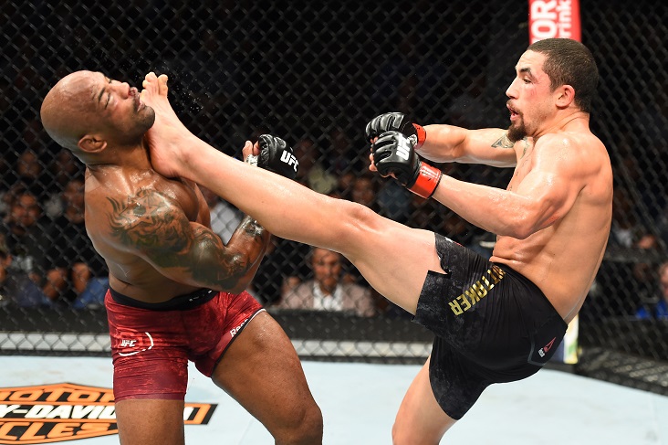 CHICAGO, ILLINOIS - JUNE 09: (R-L) Robert Whittaker of New Zealand lands a front kick to the face of Yoel Romero of Cuba in their middleweight fight during the UFC 225 event at the United Center on June 9, 2018 in Chicago, Illinois. (Photo by Josh Hedges/Zuffa LLC/Zuffa LLC via Getty Images)