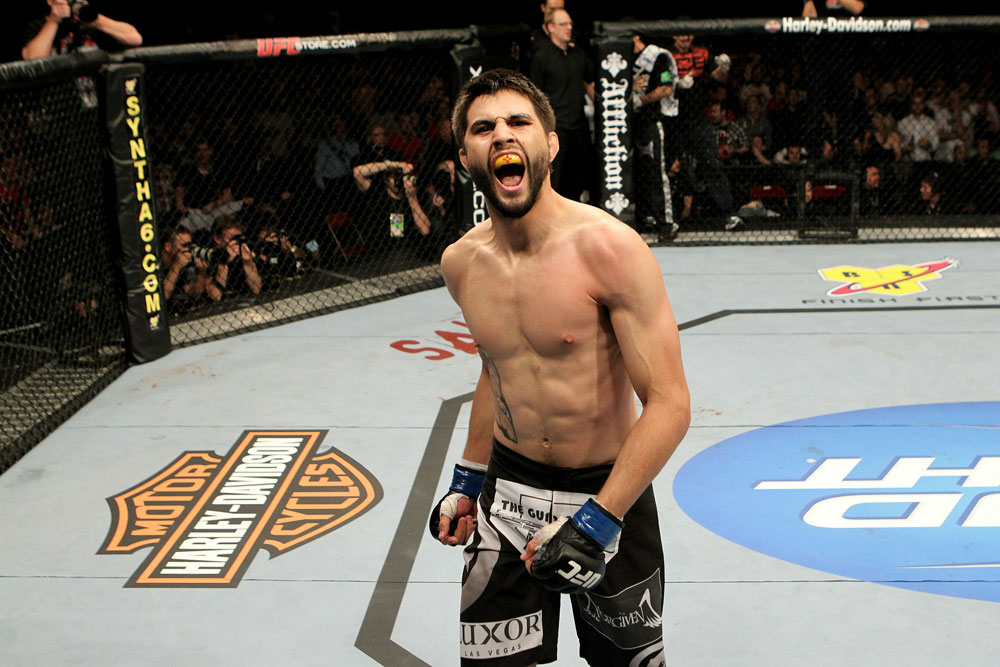 UFC 120: Carlos Condit celebrates after knocking-out Dan Hardy