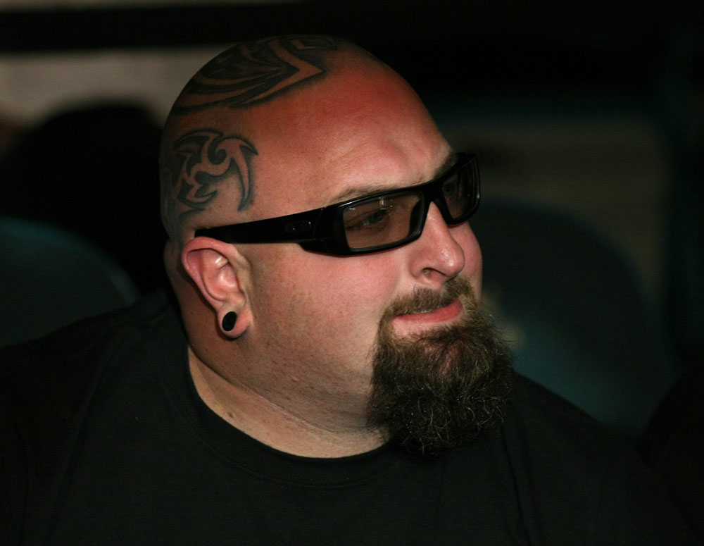 UFC 125: TV Personality, "Ton" watches the fight between Grispi and Poirier.