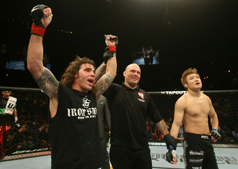 UFC 125: Clay Guida celebrates his win over Takanori Gomi.
