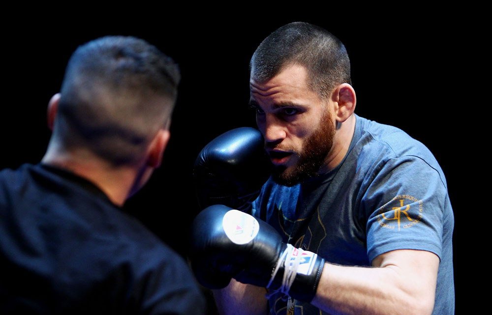 Jon Fitch does some glove work during an Open Workout