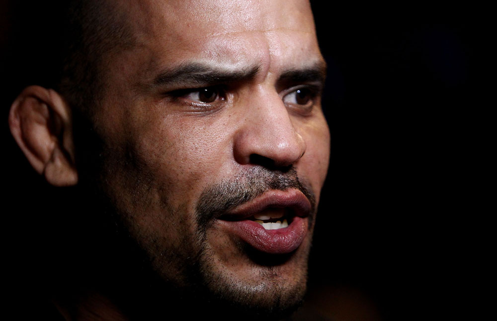 Jorge Rivera talks to the media during an Open Workout