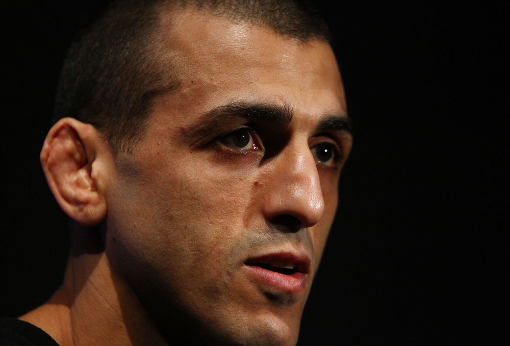 George Sotiropoulos talks to the media during an Open Workout