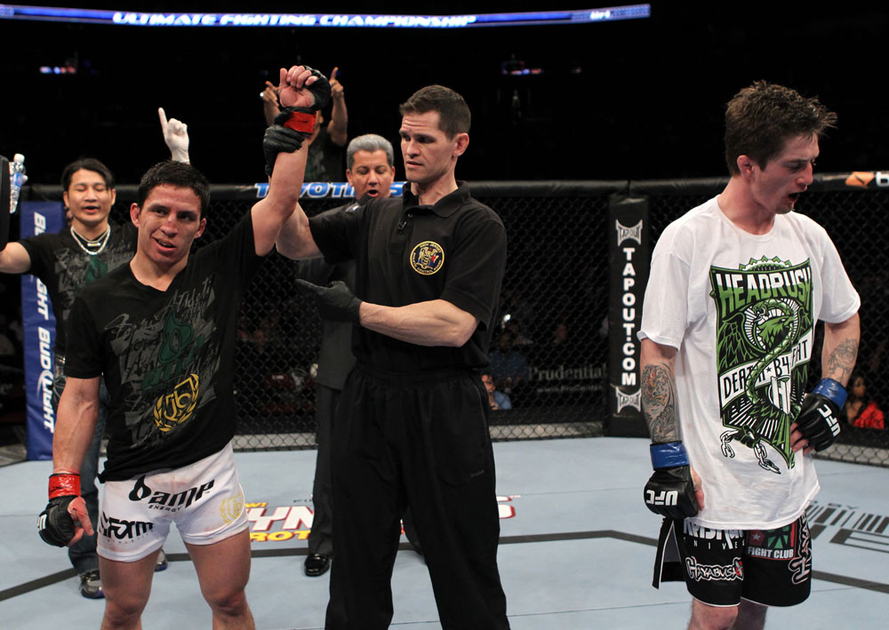 UFC 128: Benavidez named winner.