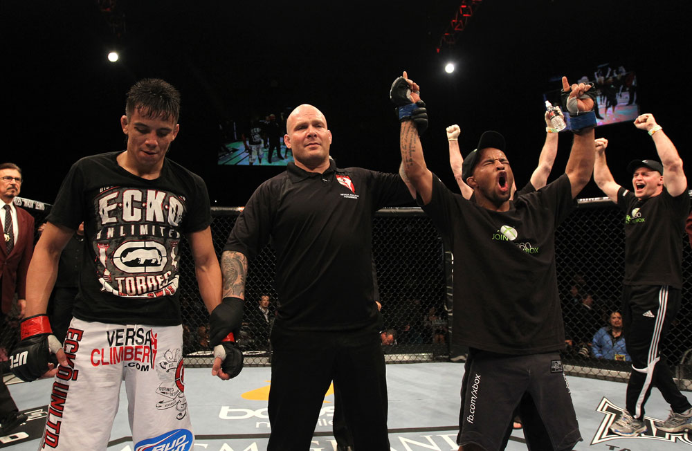UFC 130: Demetrious Johnson celebrates his win