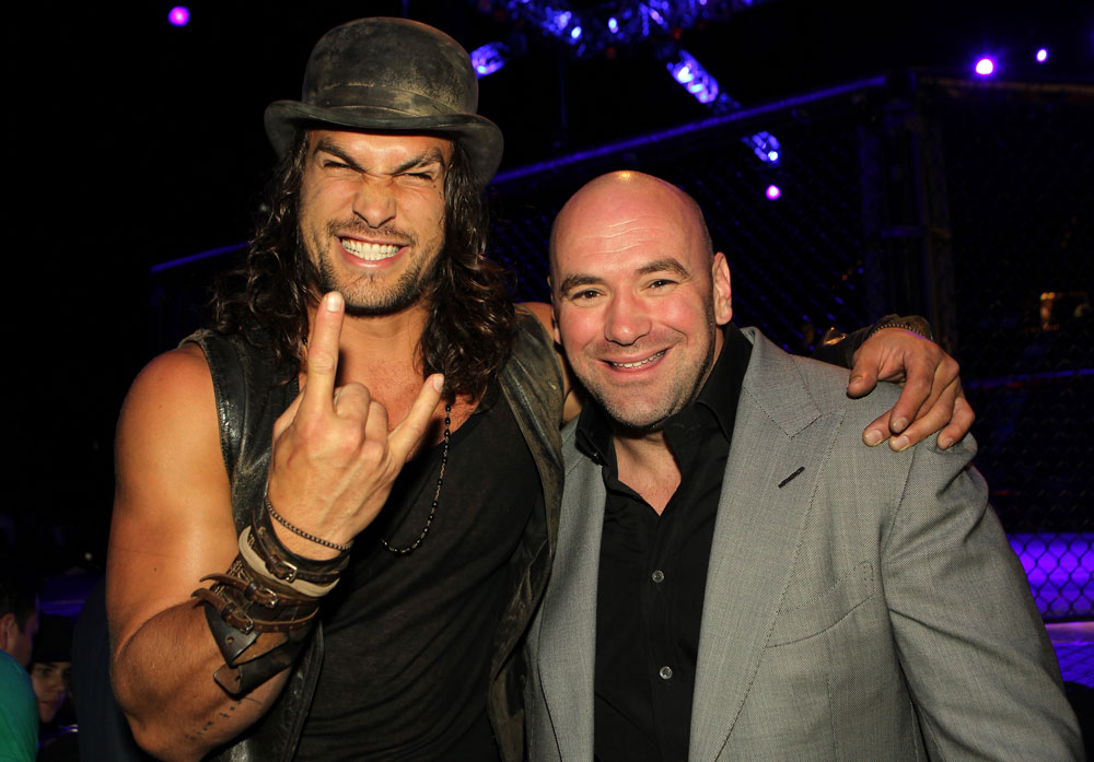 (L-R) Actor Jason Momoa and UFC President Dana White pose for a photo Octagonside at UFC 132.