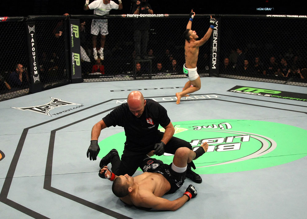 Rafael Dos Anjos celebrates after knocking out George Sotiropoulos.