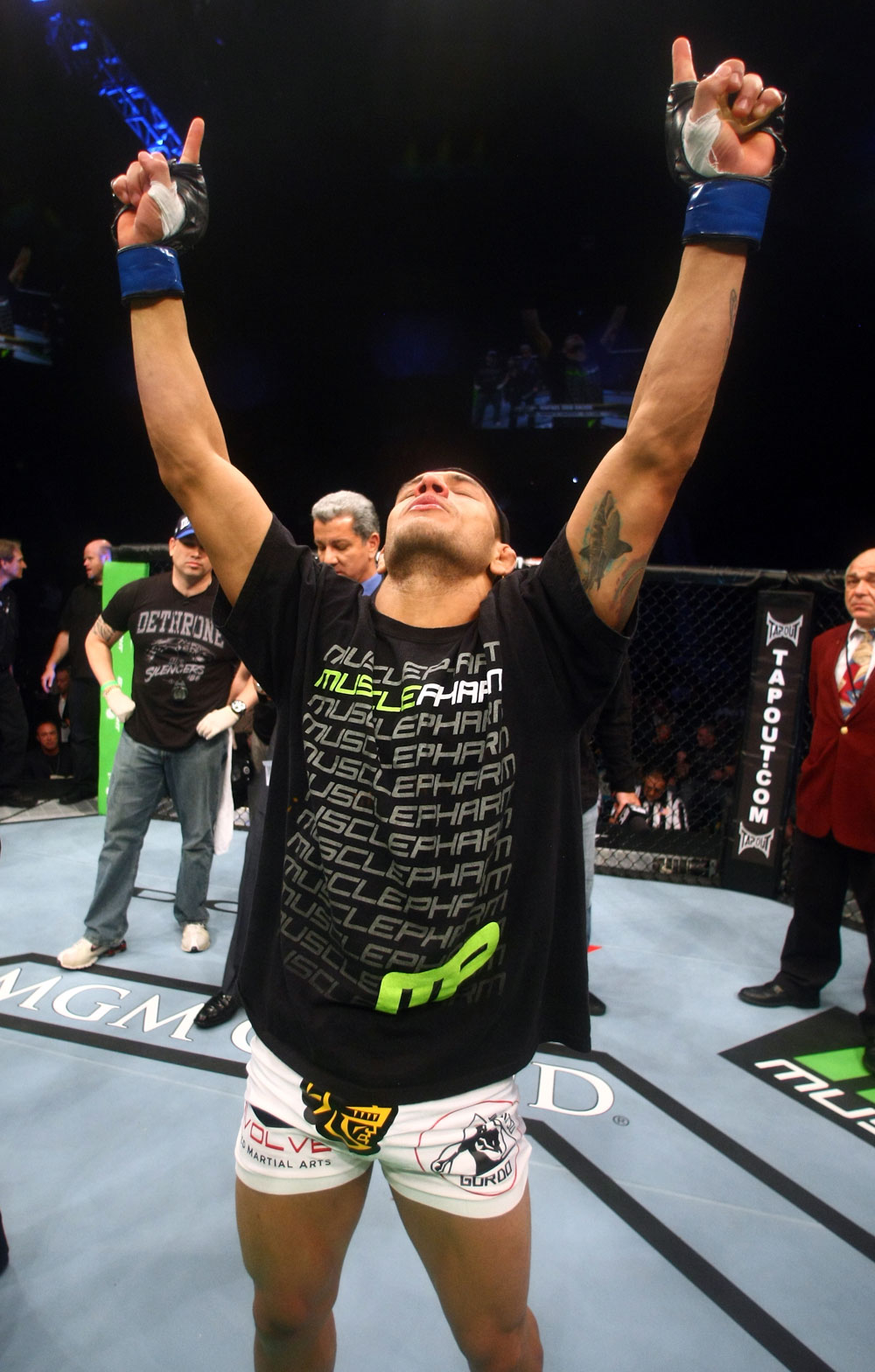 Rafael Dos Anjos celebrates after knocking out George Sotiropoulos.