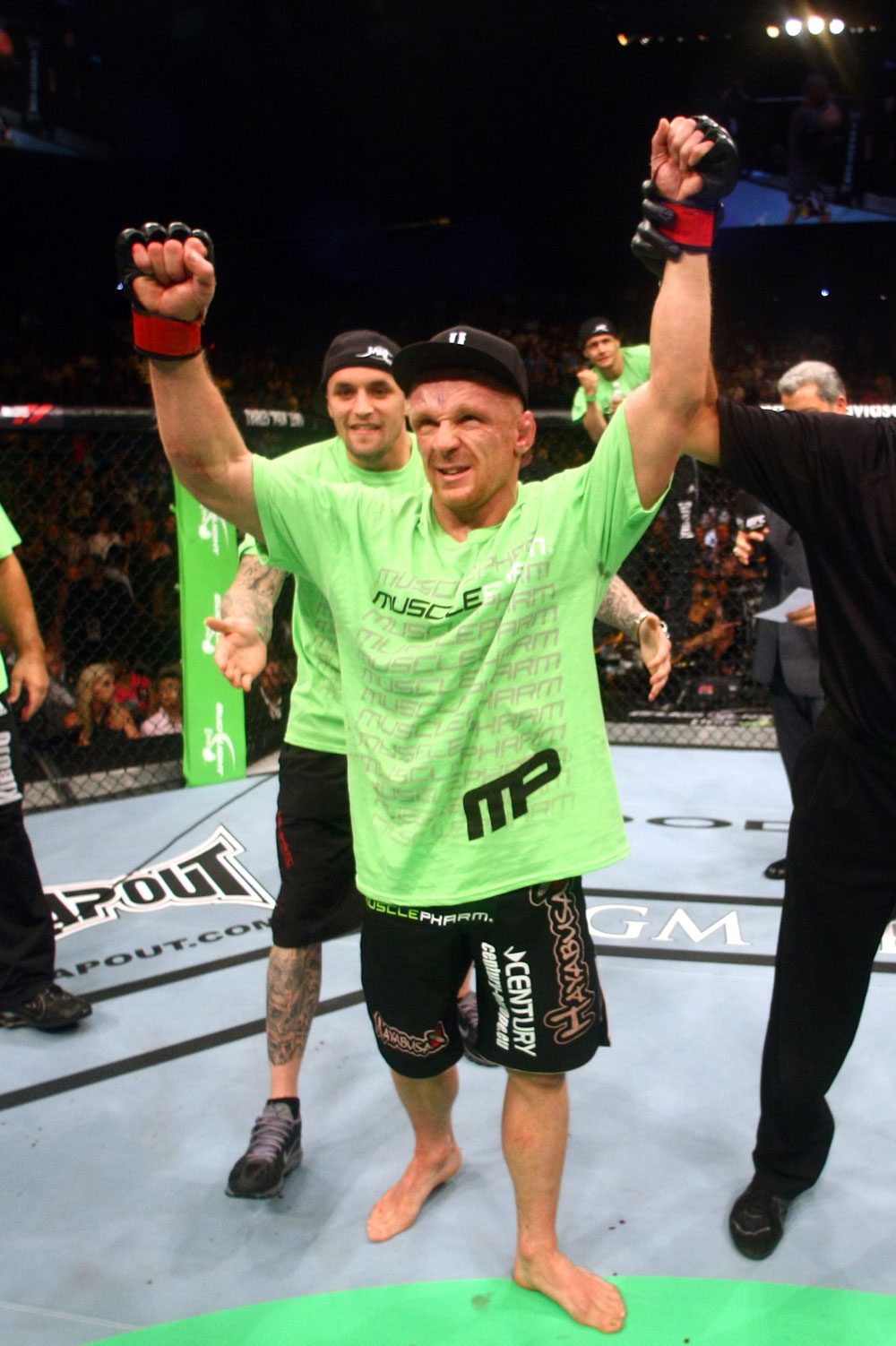 Dennis Siver celebrates his win by unanimous decision over Matt Wiman