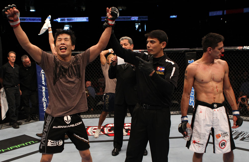 Takeya Mizugaki celebrates his win