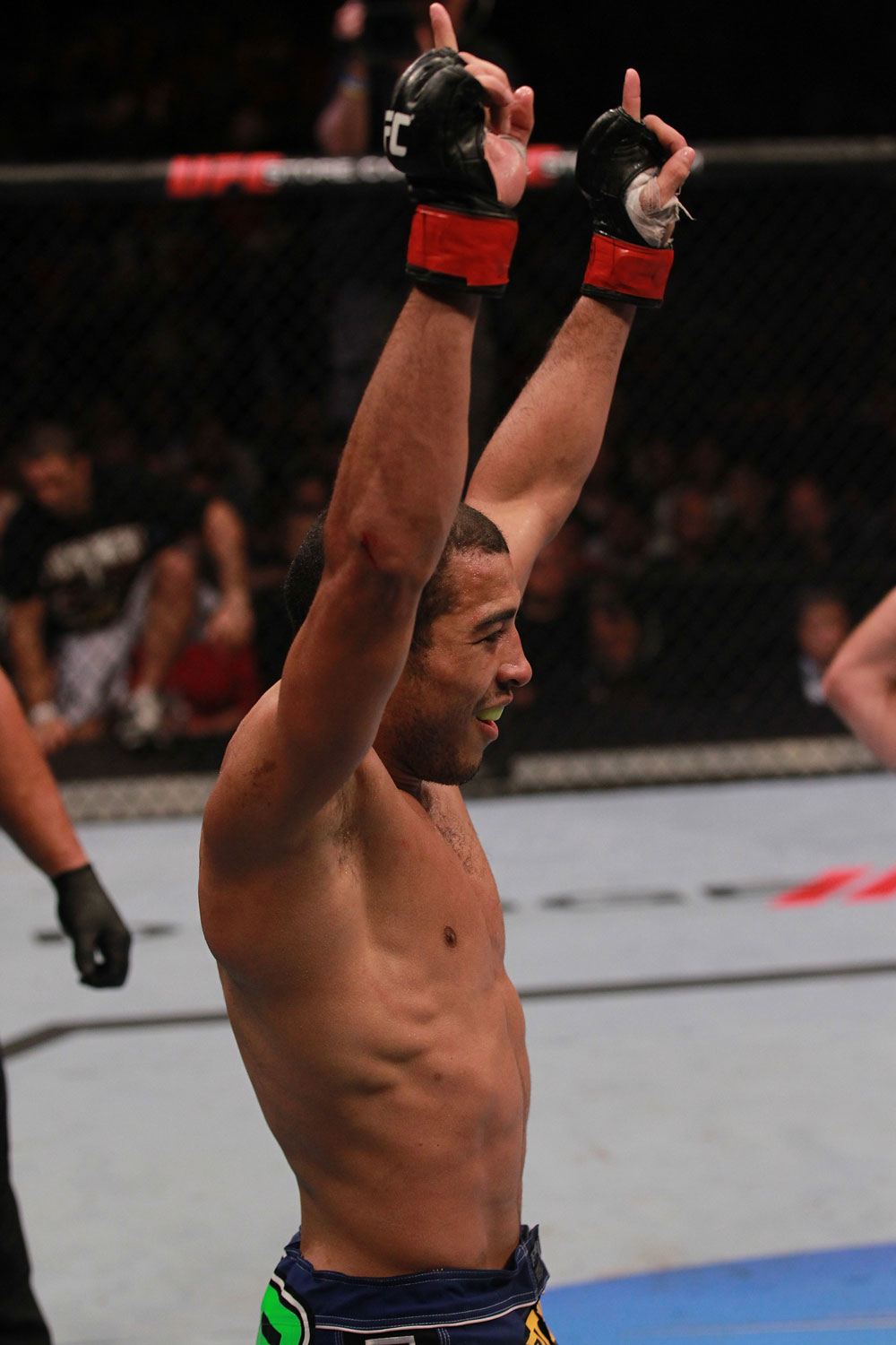 Jose Aldo celebrates his win over Kenny Florian