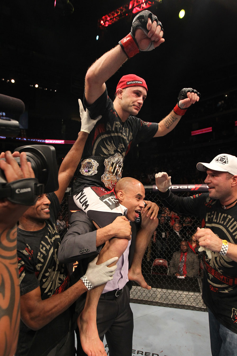 Frankie Edgar celebrates his win