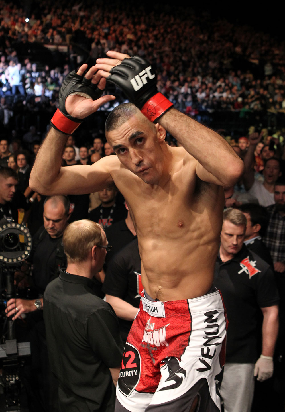 Terry Etim enters the Octagon