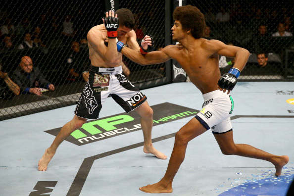 Caceres lands an uppercut Caceres lands an uppercut