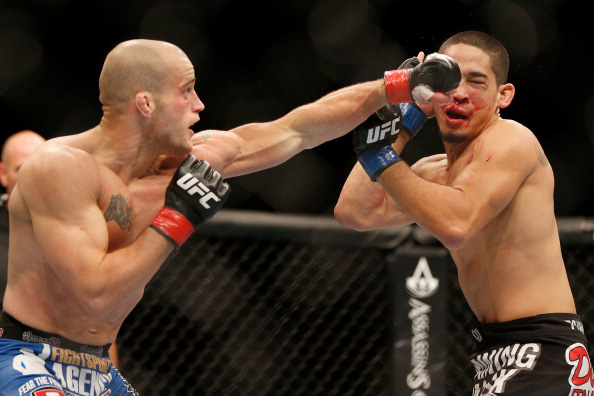 Gagnon lands a straight left against Kimura Gagnon lands a straight left against Kimura