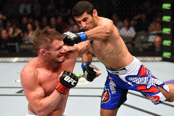 Beneil Dariush throws a flying superman punch against <a href='../fighter/Daron-Cruickshank'>Daron Cruickshank</a> in their lightweight bout during the UFC 185 event at the American Airlines Center on March 14, 2015 in Dallas, TX. (Photo by Josh Hedges/Zuffa LLC)