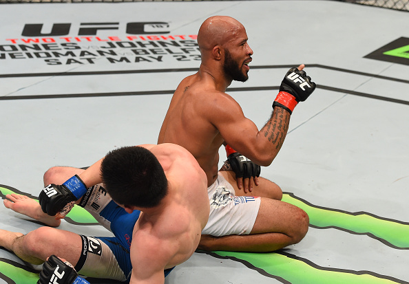 MONTREAL, QC - APRIL 25: Demetrious Johnson of the United States reacts after his submission victory over Kyoji Horiguchi of Japan in their UFC flyweight championship bout during the UFC 186 event at the Bell Centre on April 25, 2015 in Montreal, Quebec, Canada. (Photo by Josh Hedges/Zuffa LLC/Zuffa LLC via Getty Images)