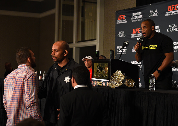 LAS VEGAS, NEVADA - MAY 23: (R-L) Daniel Cormier and Ryan Bader exchange words during the UFC 187 post-fight press conference inside the MGM Grand Hotel & Casino on May 23, 2015 in Las Vegas, Nevada. (Photo by Brandon Magnus/Zuffa LLC/Zuffa LLC via Getty Images)