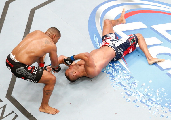 LAS VEGAS, NV - MAY 24: An overhead view of the Octagon as Daniel Cormier (black trunks) slams Dan Henderson during the UFC 173 event at the MGM Grand Garden Arena on May 24, 2014 in Las Vegas, Nevada. (Photo by Josh Hedges/Zuffa LLC/Zuffa LLC via Getty Images)