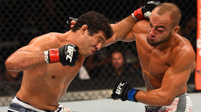 MEXICO CITY, MEXICO - JUNE 13: (L-R) Gilbert Melendez of the United States punches Eddie Alvarez of the United Statesin their lightweight bout during the UFC 188 event at the Arena Ciudad de Mexico. (Photo by Josh Hedges/Zuffa LLC)