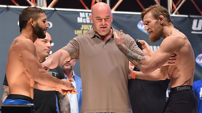 Chad Mendes and Conor McGregor face off during the UFC 189 weigh-in inside MGM Grand Garden Arena on July 10, 2015 in Las Vegas, Nevada. (Photo by Josh Hedges/Zuffa LLC)