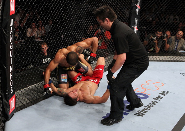 Jose Aldo punches Chad Mendes on the ground in a featherweight bout during UFC 142 at HSBC Arena on January 14, 2012 in Rio de Janeiro, Brazil. (Photo by Josh Hedges/Zuffa LLC)