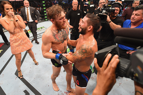 Conor McGregor and Chad Mendes congratulate each other after their UFC interim featherweight title fight during the UFC 189 event inside MGM Grand Garden Arena on July 11, 2015 in Las Vegas, Nevada. (Photo by Josh Hedges/Zuffa LLC)