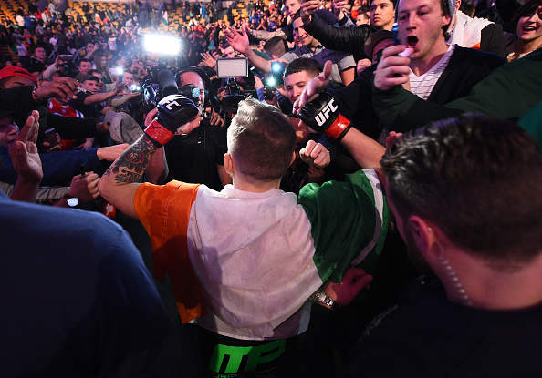 Conor McGregor of Ireland celebrates with the crowd after defeating Dennis Siver of Germany in their featherweight fight during the UFC Fight Night event at the TD Garden on January 18, 2015 in Boston, Massachusetts. (Photo by Jeff Bottari/Zuffa LLC)