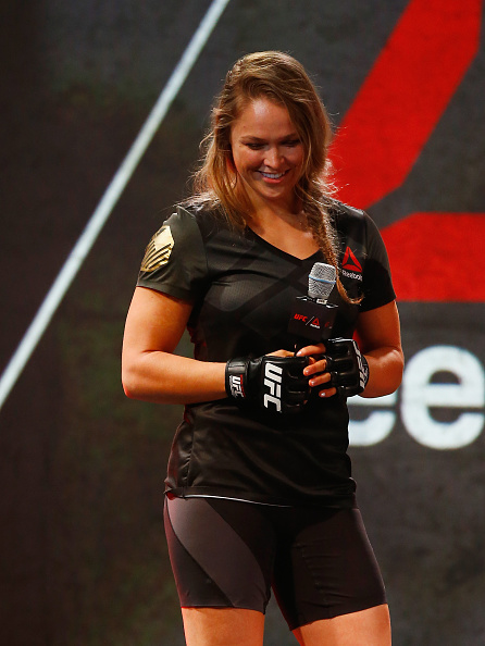 UFC champion <a href='../fighter/Ronda-Rousey'>Ronda Rousey</a> speaks to Reebok design expert Corinna Werkle during the Reebok Fight Kit Launch at Skylight Modern. (Photo by Al Bello/Zuffa LLC)