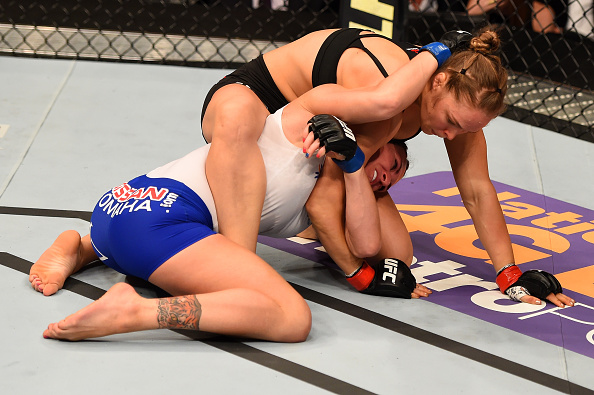 Ronda Rousey grapples with Cat Zingano in their UFC women's bantamweight championship bout during the UFC 184 event at Staples Center on February 28, 2015 in Los Angeles, California. (Photo by Josh Hedges/Zuffa LLC)