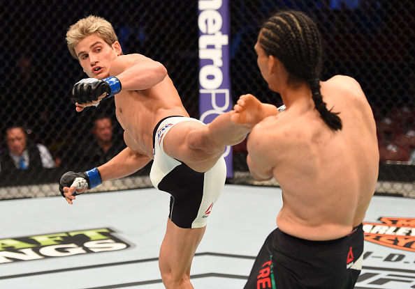 HOUSTON, TX - OCTOBER 03: (L-R) Sage Northcutt kicks Francisco Trevino in their lightweight bout during the UFC 192 event at the Toyota Center on October 3, 2015 in Houston, Texas. (Photo by Josh Hedges/Zuffa LLC)