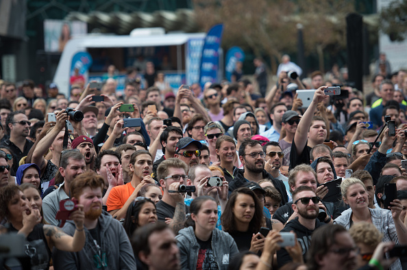 MELBOURNE, AUSTRALIA - NOVEMBER 12: Fans watch as UFC women's bantamweight champion Ronda Rousey of the United States holds an open workout for fans and media at Federation Square on November 12, 2015 in Melbourne, Australia. (Photo by Brandon Magnus/Zuffa LLC)