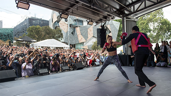 MELBOURNE, AUSTRALIA - NOVEMBER 12: UFC women's bantamweight champion Ronda Rousey of the United States holds an open workout for fans and media at Federation Square on November 12, 2015 in Melbourne, Australia. (Photo by Brandon Magnus/Zuffa LLC)