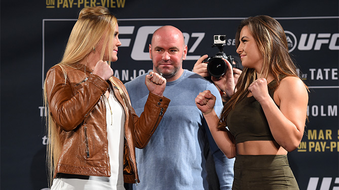 UFC President Dana White squares off Holly Holm (L) and Miesha Tate (R) during the UFC 197 on-sale press conference event inside MGM Grand Hotel & Casino on January 20, 2016 in Las Vegas, Nevada. (Photo by Jeff Bottari/Zuffa LLC)