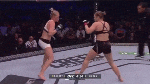 Holly Holm utilizes her quickness and punching power to rock Ronda Rousey in their UFC 193 title bout in Melbourne, Australia.