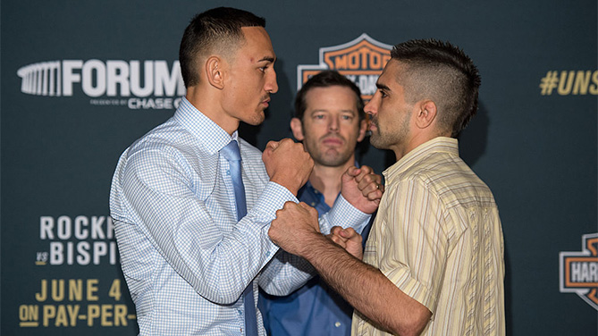 INGLEWOOD, CA - JUNE 02: (L-R) Max Holloway and Ricardo Lamas face off during the UFC 199: Ultimate Media Day at the Forum on June 2, 2016 in Inglewood, California. (Photo by Brandon Magnus/Zuffa LLC)
