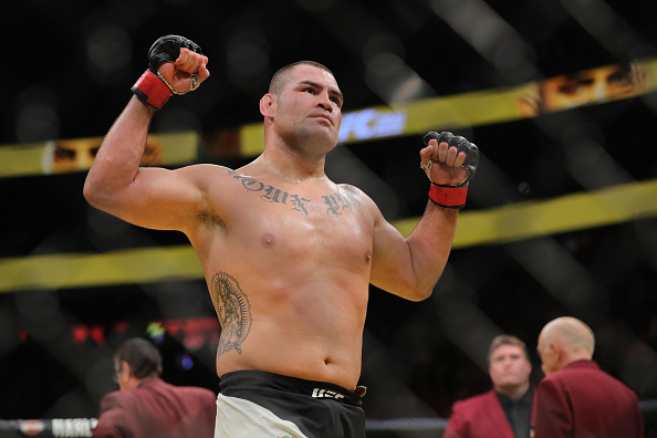Cain Velasquez celebrates after his win over Travis Browne at UFC 200