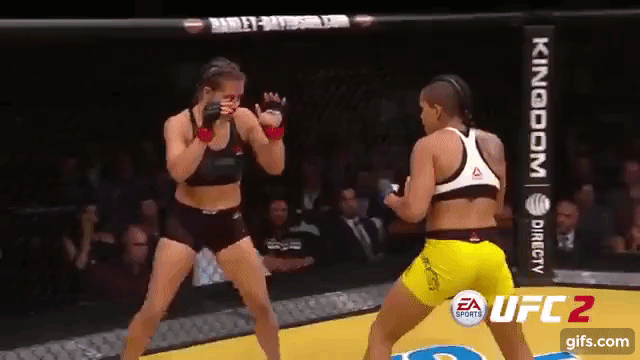 Nunes (yellow shorts) unloads on Tate (black shorts) in the main event of UFC 200. Nunes won the UFC women's bantamweight title and now makes first defense against Ronda Rousey.