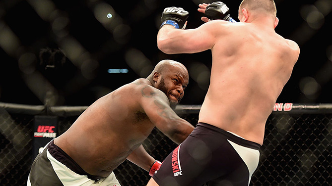 LAS VEGAS, NV - FEB. 06: (L-R) <a href='../fighter/Derrick-Lewis'>Derrick Lewis</a> punches <a href='../fighter/Damian-Grabowski'>Damian Grabowski</a> of Poland in their heavyweight bout during the UFC Fight Night event at MGM Grand Garden Arena. (Photo by Jared C. Tilton /Zuffa LLC)