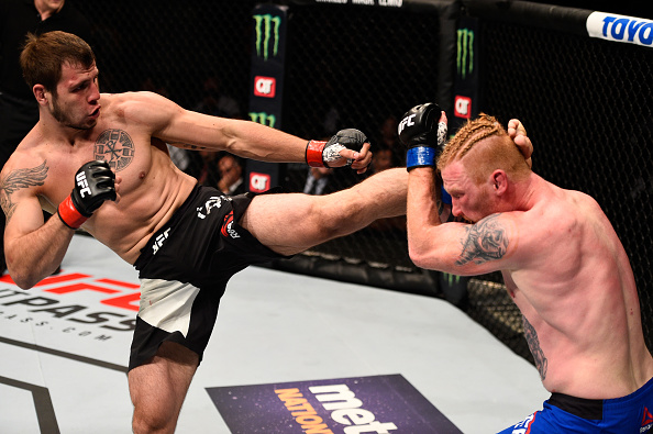 ATLANTA, GA - JULY 30: (L-R) Nikita Krylov kicks Ed Herman in their light heavyweight bout during the UFC 201 event on July 30, 2016 at Philips Arena in Atlanta, Georgia. (Photo by Jeff Bottari/Zuffa LLC)