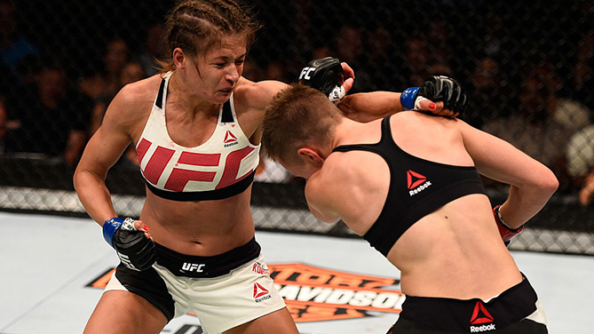 ATLANTA, GA - JULY 30: (L-R) Karolina Kowalkiewicz punches Rose Namajunas in their women's strawweight bout during the UFC 201 event on July 30, 2016. (Photo by Jeff Bottari/Zuffa LLC)