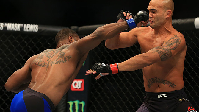 ATLANTA, GA - JULY 30: (L-R) <a href='../fighter/Tyron-Woodley'>Tyron Woodley</a> delivers a right hand to knock down opponent <a href='../fighter/Robbie-Lawler'>Robbie Lawler</a> in their welterweight championship bout during the UFC 201 event on July 30, 2016. (Photo by Daniel Shirey/Zuffa LLC)