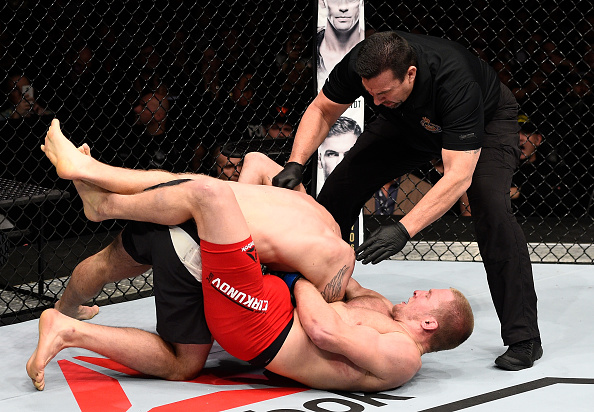 TORONTO, CANADA - DECEMBER 10: (R-L) Misha Cirkunov of Latvia secures a guillotine choke submission against Nikita Krylov of Ukraine in their light heavyweight bout during the UFC 206 event inside the Air Canada Centre on December 10, 2016 in Toronto, Ontario, Canada. (Photo by Jeff Bottari/Zuffa LLC)