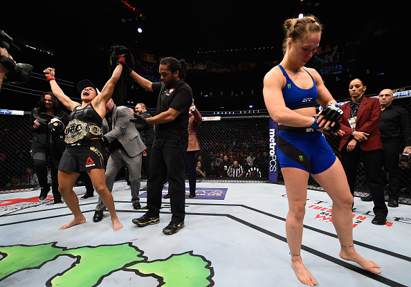 Nunes attempts to take down <a href='../fighter/Miesha-Tate'><a href='../fighter/Miesha-Tate'>Miesha Tate</a></a> during their title fight at UFC 200